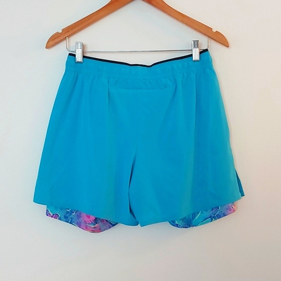 Chubbies Ultimate Training 5.5" Shorts Aqua Blue With Pink Dinosaur Print Lining - Picture 3 of 8